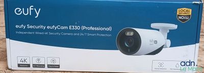 a box with a camera inside of it on the floor