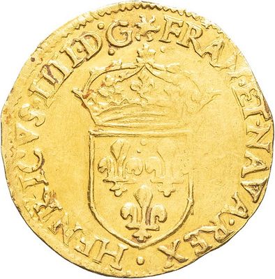 a gold coin with a crown on top of it