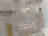 a clear box with a lot of different items inside of it