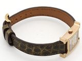 an image of a wrist watch with a brown leather band
