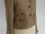 an image of a woman ' s jacket on a mannequin