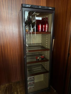 an image of a refrigerator with a lot of drinks in it