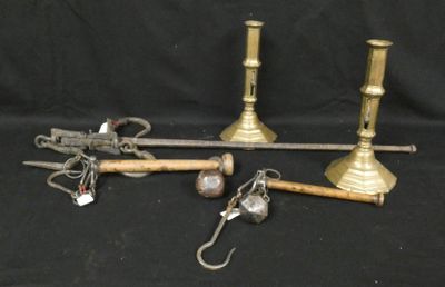 a lot of brass items that are on a black background