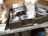 many boxes of electronics on a shelf in a room
