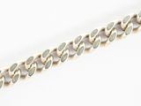 a close up of a silver chain on a white background