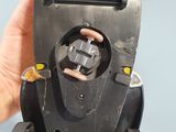 a person holding a skateboard in their hand