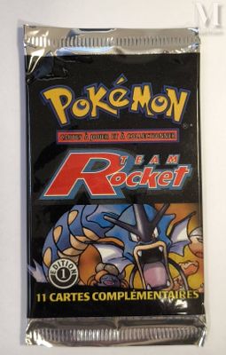 the back of a pack of pokemon trading cards on a white surface