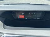 a car dashboard with a digital display on it