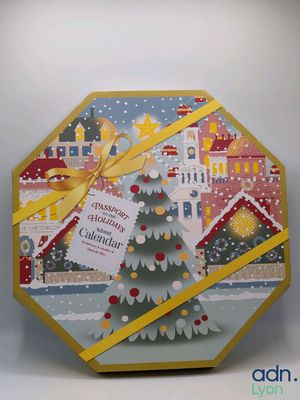 a close up of a box with a christmas tree on it