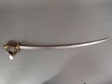 a sword that is on display on a table