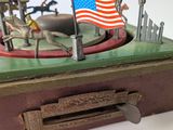 a toy of a horse and carriage with a flag on top of it