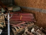 a pile of wood and other items in a storage area