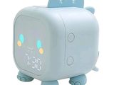 a blue alarm clock with a dinosaur design on it