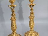 pair of antique brass candlesticks with lion heads
