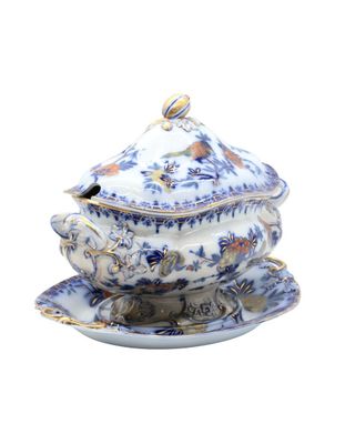 a picture of a blue and white tureeny with a bird on it