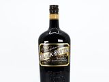 bottle of black bottle of scotch whisky on a white background