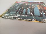 a magazine with a picture of the beatles on it