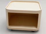 a small table with a shelf on top of it