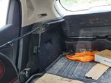 a car that has a box in the back of it