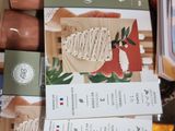 a box full of different types of soaps and soap bars