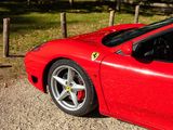 a red sports car parked on the side of the road