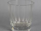 a glass of water that is sitting on a table