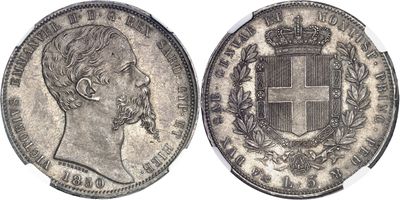 a silver coin with a crown and a cross on it