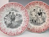 three red and white plates with pictures of people on them