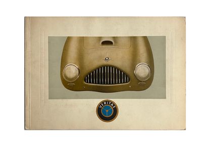 un vieux livre sur lequel figure l'image d'une voiture arborant l'emblème BMW