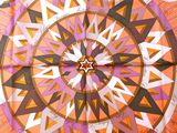 an image of a colorful circular design on a pink and orange background