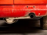 an image of a red truck parked in a parking lot