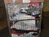 a cart with a lot of clothes on top of it