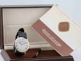 a watch that is in a box on a table