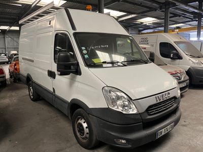 a white van that is parked in a garage