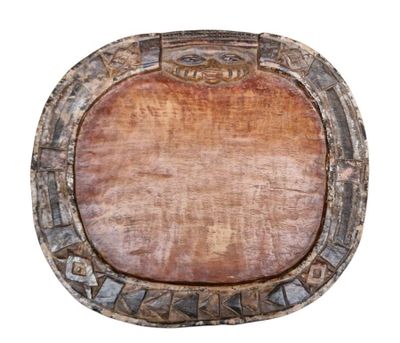 an image of a wooden plate with a decorative design on it