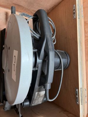 a machine that is sitting inside of a wooden box