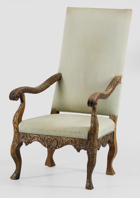 une image représentant une chaise dont l'assise et les accoudoirs sont recouverts de tissu vert