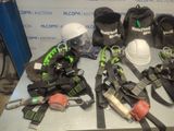 a table with a lot of safety gear on it