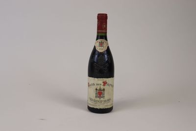 a bottle of wine that is sitting on a table
