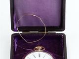 an image of a purple box with a white clock inside of it