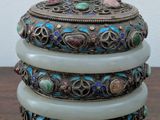 three bangles are stacked on top of each other on a table