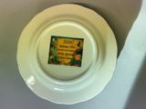 a white plate with a label on it that says 2000