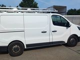 a white van that is parked in a parking lot