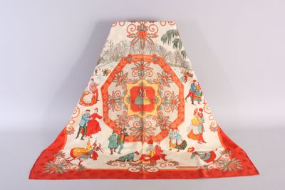 an orange and white blanket with a picture of people and animals on it