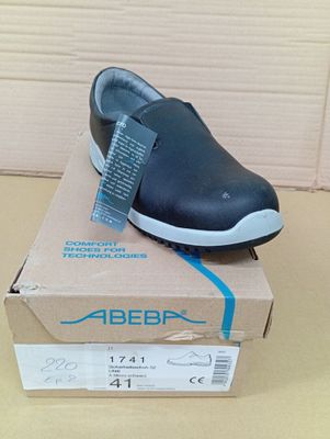 a box with a pair of shoes on top of it