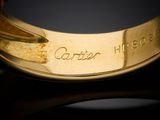 an image of a close up of a gold ring with a name engraved on it