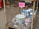 a cage with a lot of items inside of it