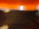 a label on the back of a guitar that says leon bernardel
