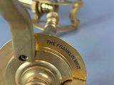 a close up of a brass plate with the words the franklin mark on it