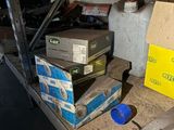 many boxes on the shelf in the garage